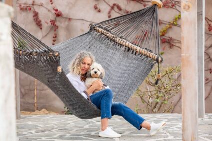 Amanda DuBois and her dog Delaney at home in Todos Santos, taking a break from protecting your rights in mediation and family law.