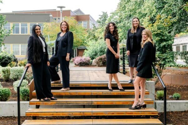 Dubois Law attorneys posing on stairs